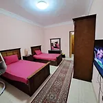 2-Bedrooms Apartment With Quiet Sitting Area In Front Of It