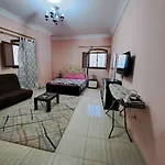 2-Bedrooms Apartment With Quiet Sitting Area In Front Of It