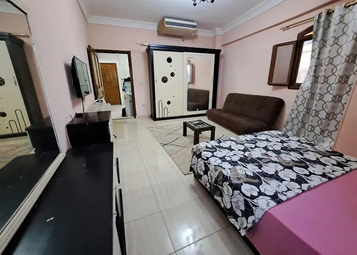 2-Bedrooms Apartment With Quiet Sitting Area In Front Of It