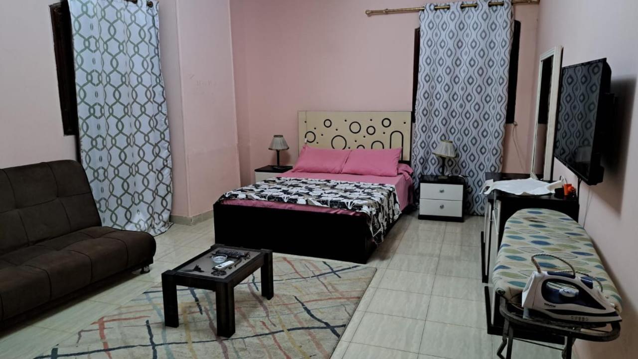 Apartment 2-bedrooms With Quiet Sitting Area In Front Of It Cairo